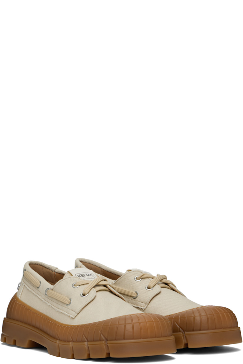 Cotton canvas boat shoes in beige.

· Rubber cap toe
· Lace-up closure
· Logo patch at tongue
· Logo hardware at outer side
· Logo embossed at heel counter
· Buffed leather and suede lining
· Textured rubber midsole
· Treaded rubber sole

Supplier color: Beige