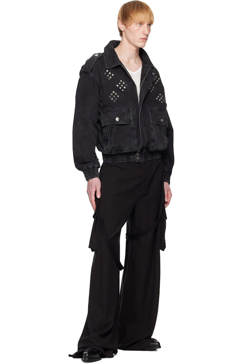 Non-stretch denim jacket. Fading throughout. 

· Spread collar
· Concealed two-way zip closure
· Grommets at front and underarms
· Flap pockets and welt pockets
· Elasticized hem and cuffs
· Epaulets
· Dropped shoulders
· Twin pleats at back 
· Logo-engraved silver-tone hardware

Supplier color: Black