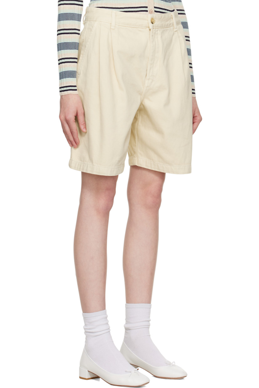 Overdyed non-stretch denim shorts. 

· Belt loops
· Four-pocket styling
· Zip fly
· Pleats at front
· Leather logo patch at back waistband
· Logo embroidered at back

Supplier color: Paper
