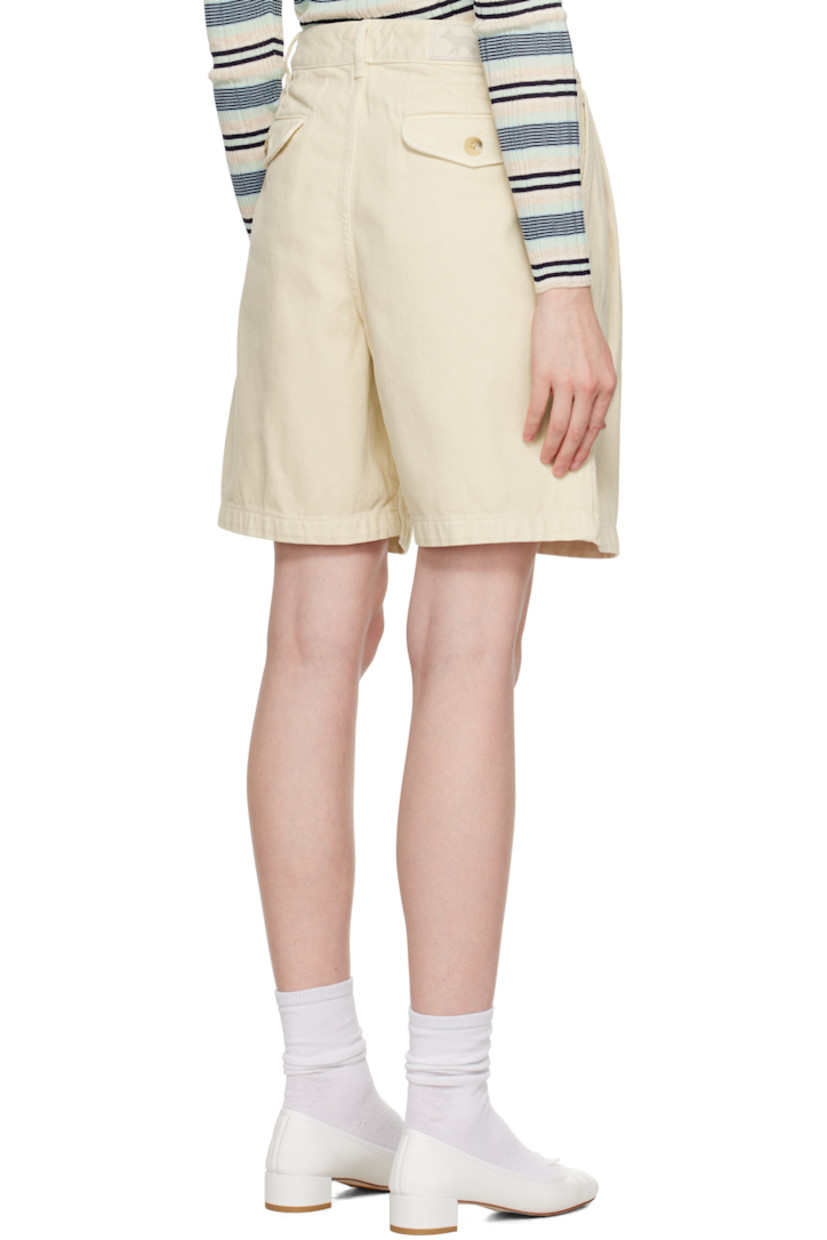 Overdyed non-stretch denim shorts. 

· Belt loops
· Four-pocket styling
· Zip fly
· Pleats at front
· Leather logo patch at back waistband
· Logo embroidered at back

Supplier color: Paper