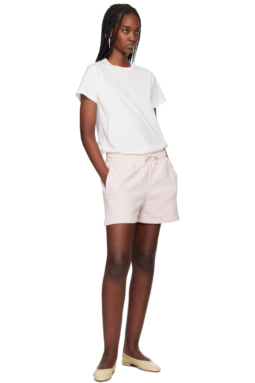 French terry shorts. 

· Drawstring at elasticized waistband
· Two-pocket styling
· Embroidered logo graphic patch at front

Supplier color: Rosewater
