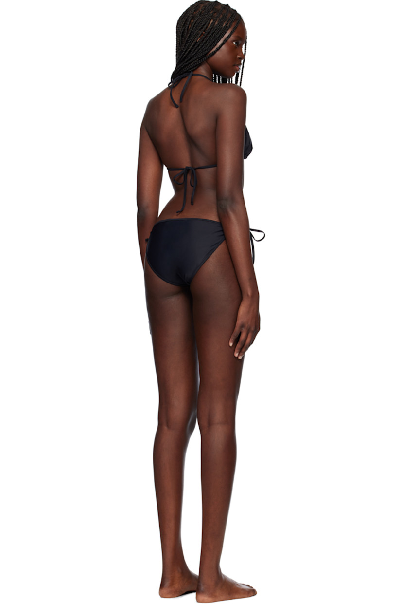 Stretch recycled nylon jersey bikini top.

· Logo charm at front
· Self-tie halter strap
· Self-tie fastening at back
· Fully lined

Stretch recycled nylon jersey bikini bottom.

· Self-tie strap at sides
· Fully lined

Supplier color: Black