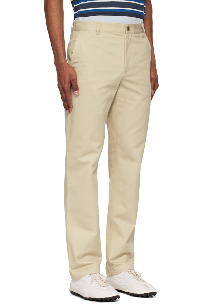 Straight-leg cotton gabardine trousers. 

· Belt loops
· Four-pocket styling
· Zip fly
· Logo patch at back waist

Supplier color: Dune