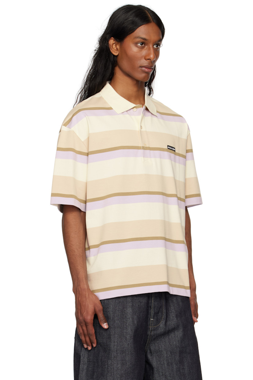 Oversized cotton jersey polo. Jacquard stripes throughout.

· Rib-knit spread collar
· Three-button placket
· Logo patch at chest
· Tennis-tail hem
· Dropped shoulders

Supplier color: Soft mauve/Cardamone
