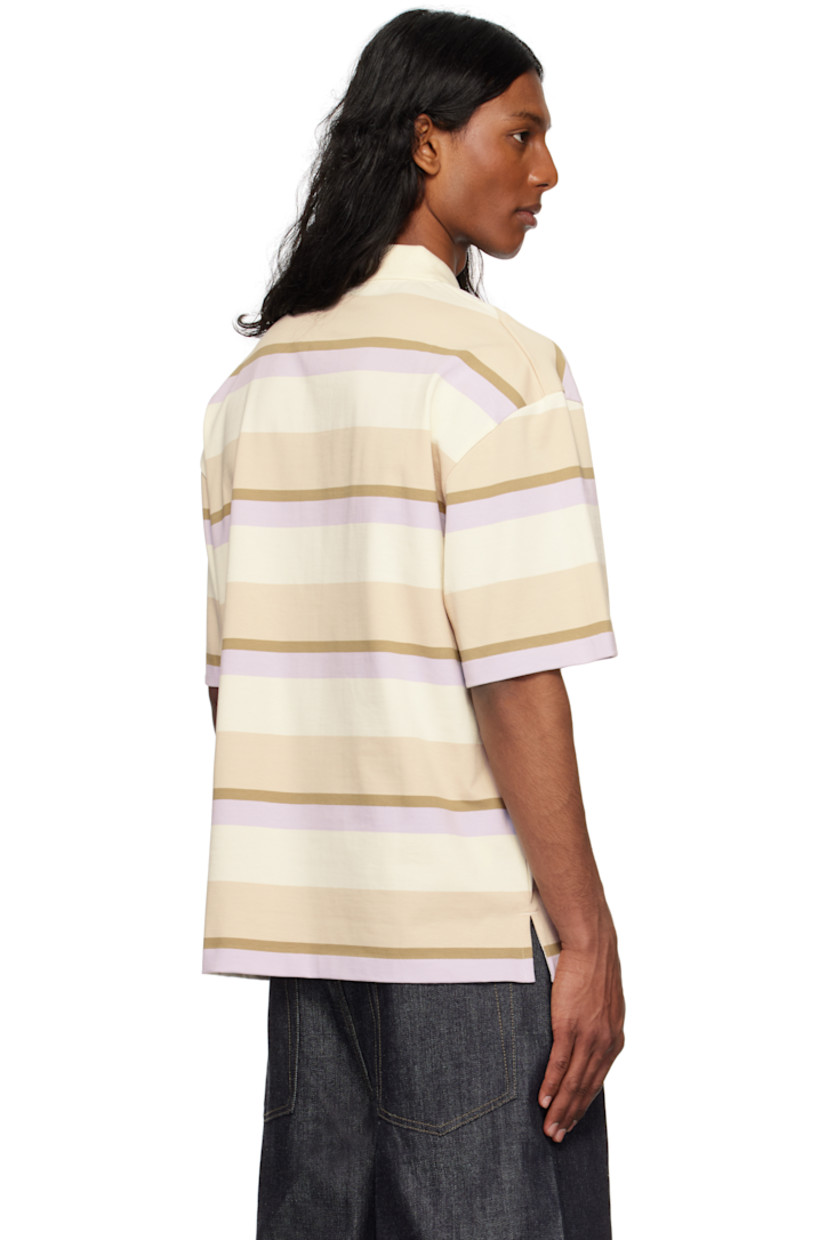 Oversized cotton jersey polo. Jacquard stripes throughout.

· Rib-knit spread collar
· Three-button placket
· Logo patch at chest
· Tennis-tail hem
· Dropped shoulders

Supplier color: Soft mauve/Cardamone