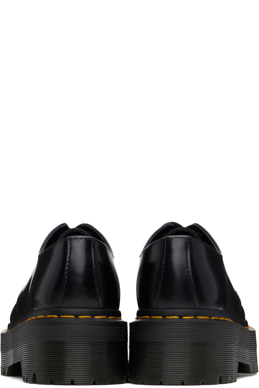 Polished leather derbys in black.

· Lace-up closure
· Yellow topstitching at heat-sealed Goodyear welt
· Platform rubber midsole and heel
· Treaded Air Cushion rubber sole
· Platform: H1.5"
· Heel: H2"

Supplier color: Black