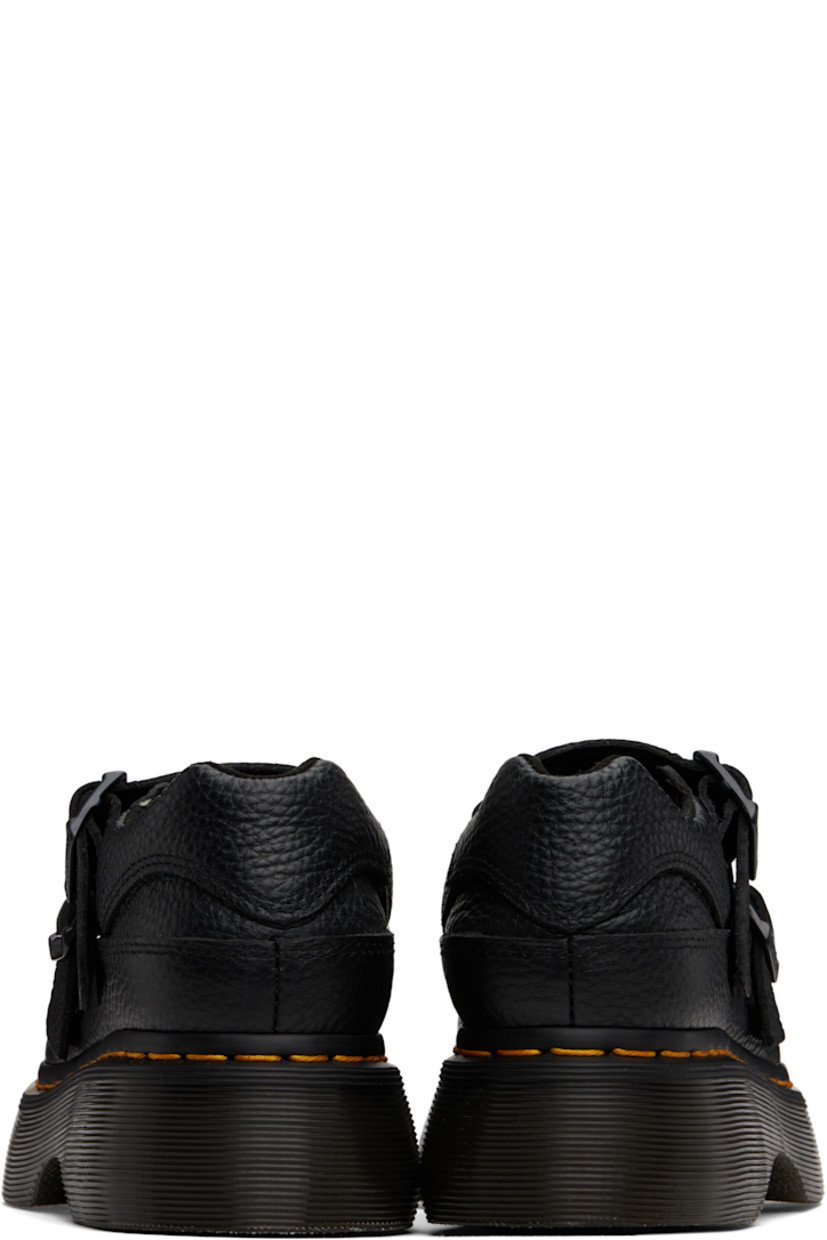 Pebble-grained nappa leather Mary Jane-style loafers in black.

· Pin-buckle straps at vamp
· Padded collar
· Suede lining
· Yellow topstitching at heat-sealed Goodyear welt
· Treaded Air Cushion rubber platform sole
· Platform: H1.5"

Supplier color: Black milled nappa