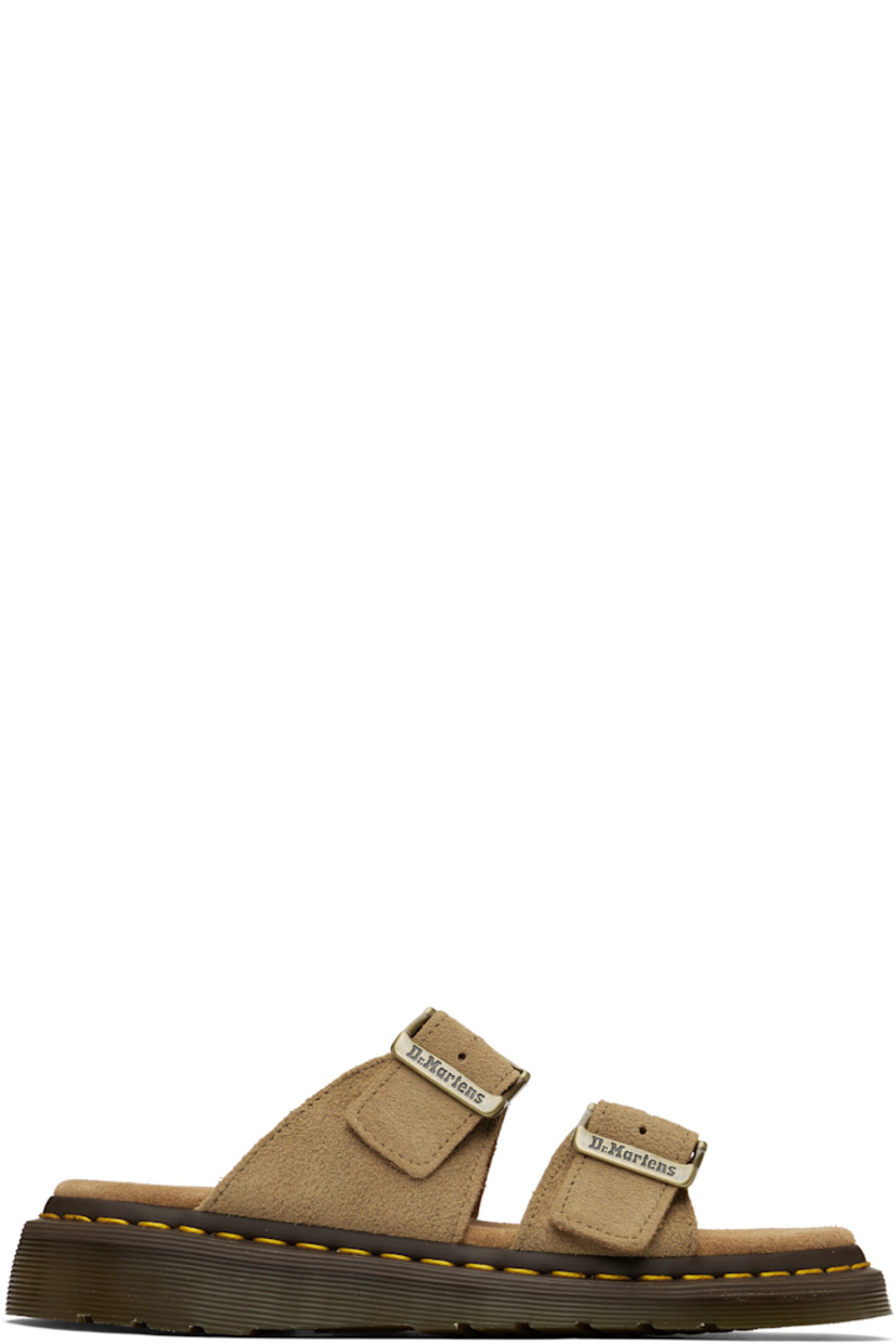 Suede sandals in tan.

· Open toe
· Pin-buckle straps at vamp
· Logo embossed at padded footbed
· Yellow topstitching at heat-sealed Goodyear welt
· Textured Air Cushion rubber platform midsole
· Treaded rubber sole
· Logo-engraved antiqued gold-tone hardware
· Platform: H1.25"

Supplier color: Savannah tan/Bronx suede