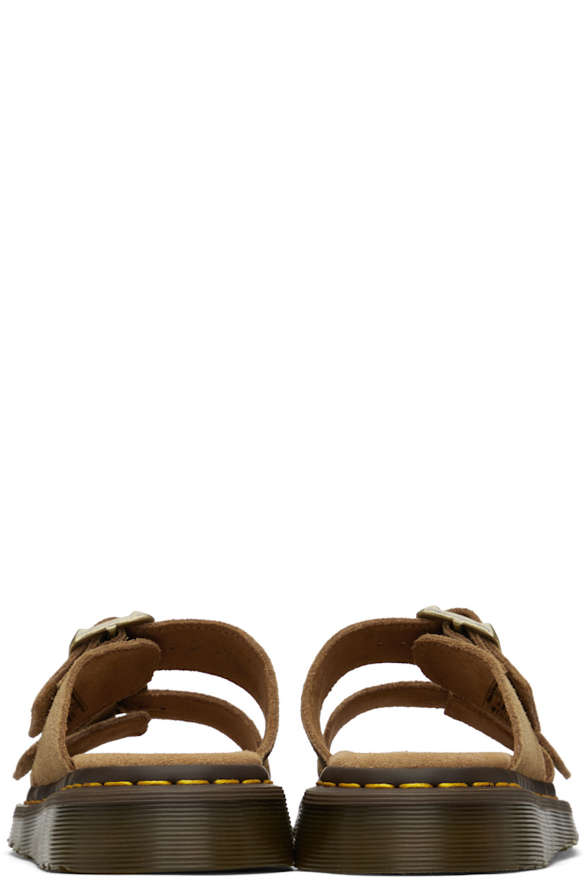 Suede sandals in tan.

· Open toe
· Pin-buckle straps at vamp
· Logo embossed at padded footbed
· Yellow topstitching at heat-sealed Goodyear welt
· Textured Air Cushion rubber platform midsole
· Treaded rubber sole
· Logo-engraved antiqued gold-tone hardware
· Platform: H1.25"

Supplier color: Savannah tan/Bronx suede