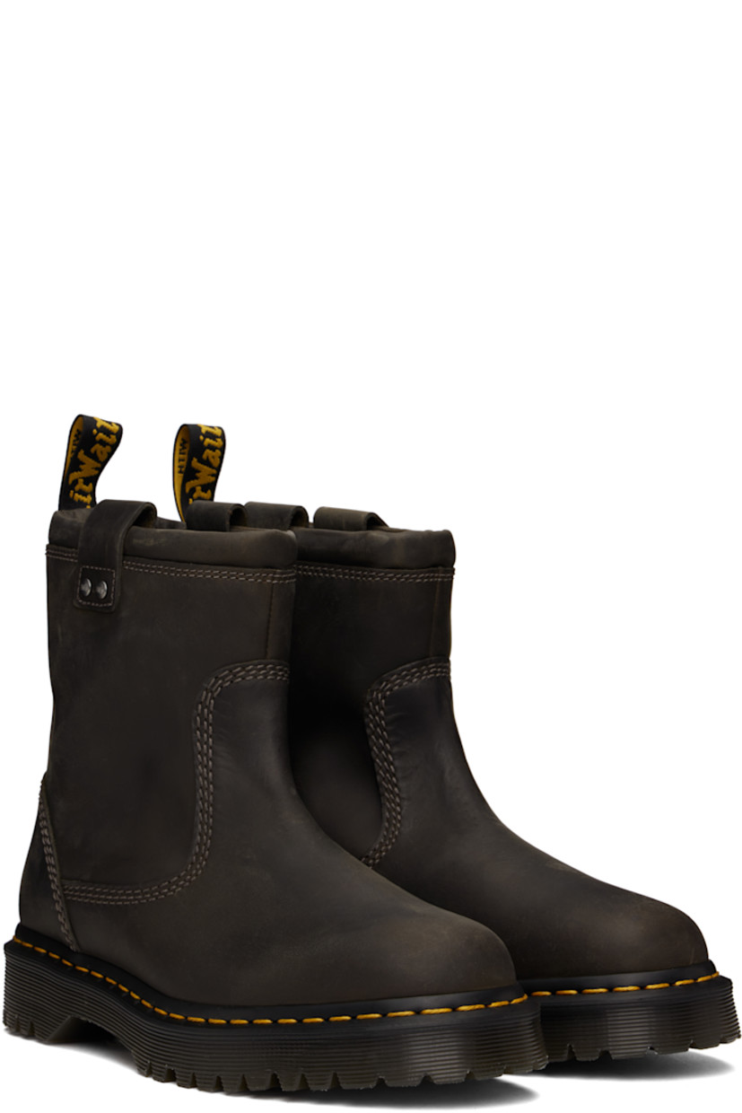 Ankle-high waxed buffed leather boots in gray.

· Fading throughout
· Pull-loops at collar
· Logo-engraved rivets at sides
· Yellow topstitching at heat-sealed Goodyear welt
· Treaded Air Cushion rubber sole

Supplier color: Charcoal grey