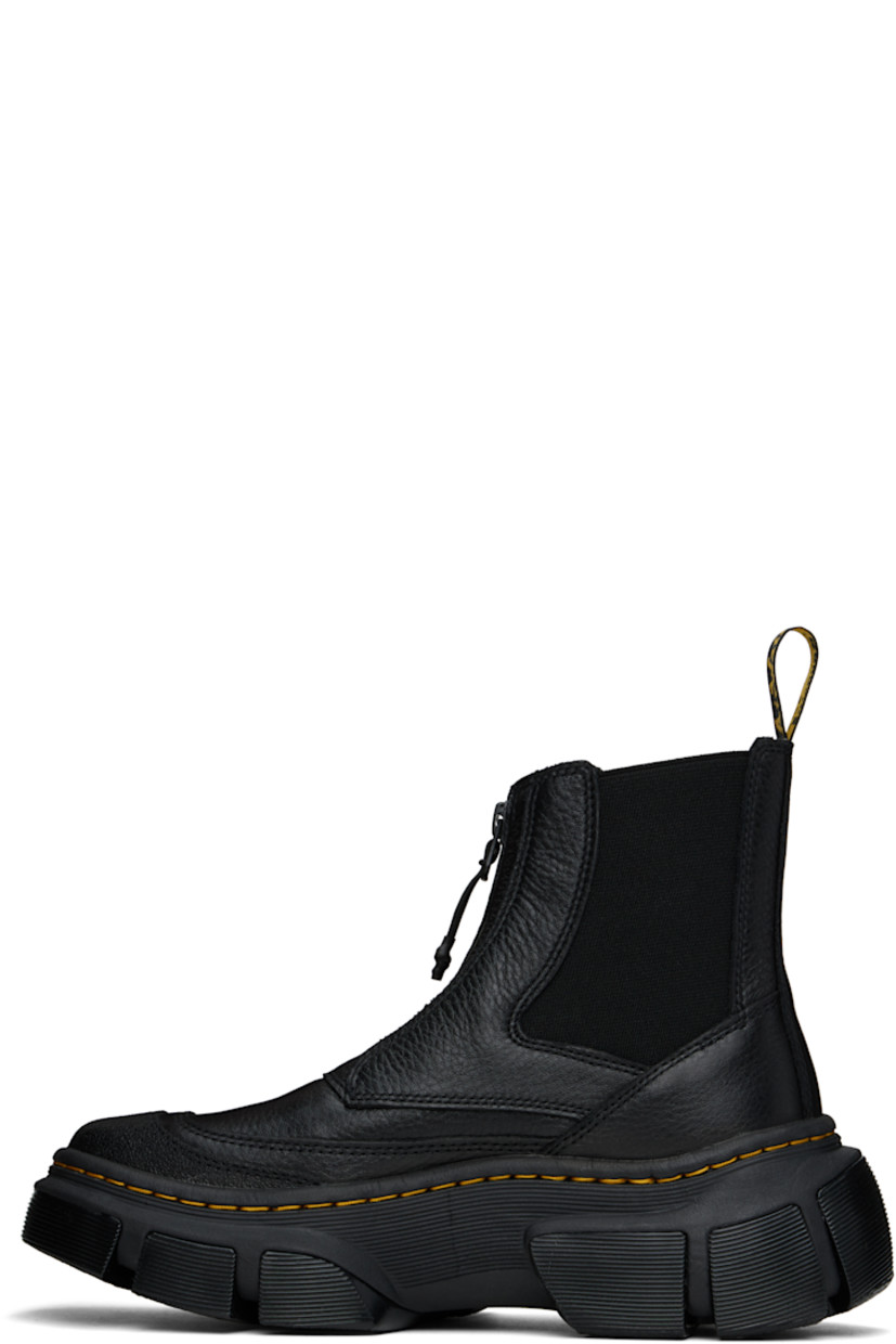 Ankle-high nappa leather Chelsea boots in black.

· Textured cap toe
· Zip closure
· Elasticized gusset at sides
· Pull-loop at heel collar
· Logo stamp at padded SoftWair® footbed
· Mesh lining
· Yellow topstitching at heat-sealed Goodyear welt
· Treaded Air Cushion rubber platform sole
· Platform: H2.25"

Supplier color: Black lunar