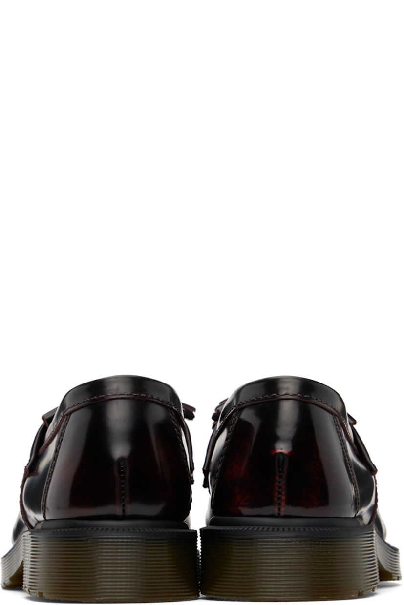 Buffed leather loafers in burgundy.

· Moc toe
· Tassels and fringed trim at vamp
· Suede and canvas lining
· Heat-sealed Goodyear welt
· Treaded Air Cushion rubber sole
· Heel: H1.25"

Supplier color: Cherry red arcadia