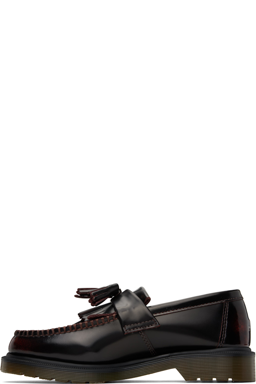 Buffed leather loafers in burgundy.

· Moc toe
· Tassels and fringed trim at vamp
· Suede and canvas lining
· Heat-sealed Goodyear welt
· Treaded Air Cushion rubber sole
· Heel: H1.25"

Supplier color: Cherry red arcadia