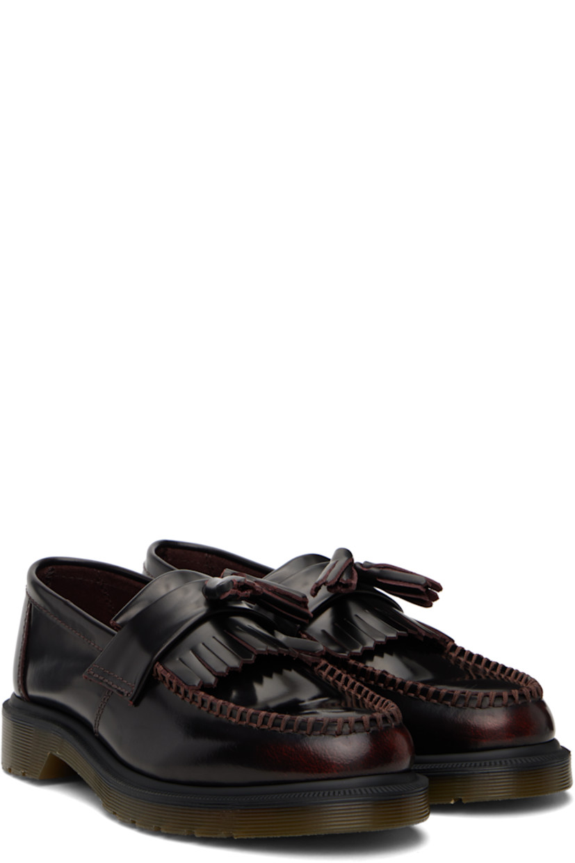 Buffed leather loafers in burgundy.

· Moc toe
· Tassels and fringed trim at vamp
· Suede and canvas lining
· Heat-sealed Goodyear welt
· Treaded Air Cushion rubber sole
· Heel: H1.25"

Supplier color: Cherry red arcadia