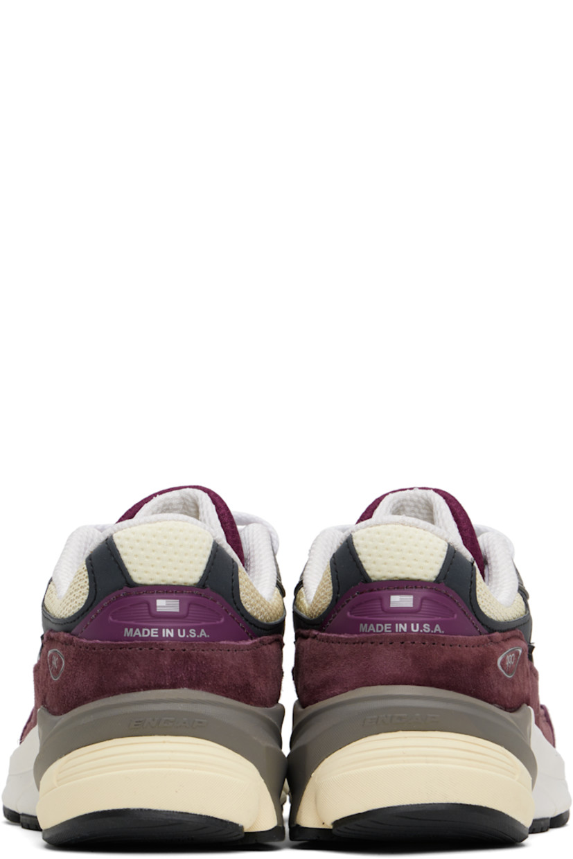 Low-top mesh and pigskin suede sneakers in burgundy and beige.

· Reflective trim throughout
· Logo printed at vamp
· Lace-up closure
· Logo patch at padded tongue
· Padded collar
· Reflective logo appliqué at sides
· Logo-printed tab at heel counter
· Mesh lining
· ENCAP® and FuelCell foam rubber midsole
· Treaded Ndurance™ rubber sole

Supplier color: Dark ember/Afterglow
