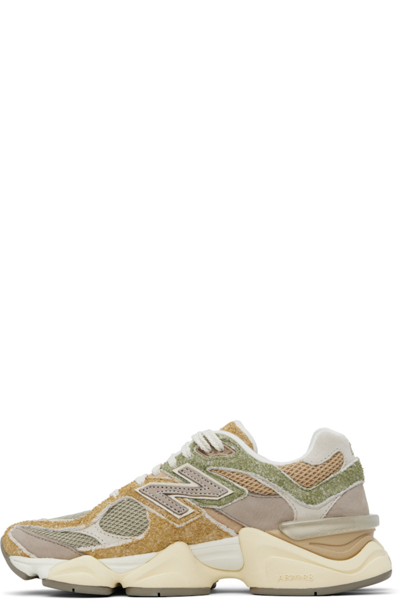 Low-top pigskin suede, buffed pigskin, and mesh sneakers in khaki and gray.

· Logo embroidered at vamp and heel tab
· Lace-up closure
· Rubberized logo patch at padded tongue
· Padded collar
· Logo appliqué at sides
· Jersey lining
· CR stability device at heel
· ABZORB SBS foam rubber midsole
· Treaded rubber sole

Supplier color: Olivine/Great plains/Arid stone
