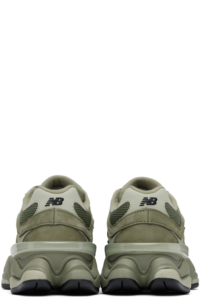 Low-top pigskin nubuck, buffed pigskin, and mesh sneakers in green. Logo embroidered at vamp, inner side, and heel tab.

· Lace-up closure
· Rubberized logo patch at padded tongue
· Padded collar
· Logo appliqué at outer side
· Rubber CR trim at heel counter
· Fleece lining
· ABZORB and SBS dual-density foam rubber midsole
· Treaded rubber sole

Supplier color: Dark olivine/Olivine/Black