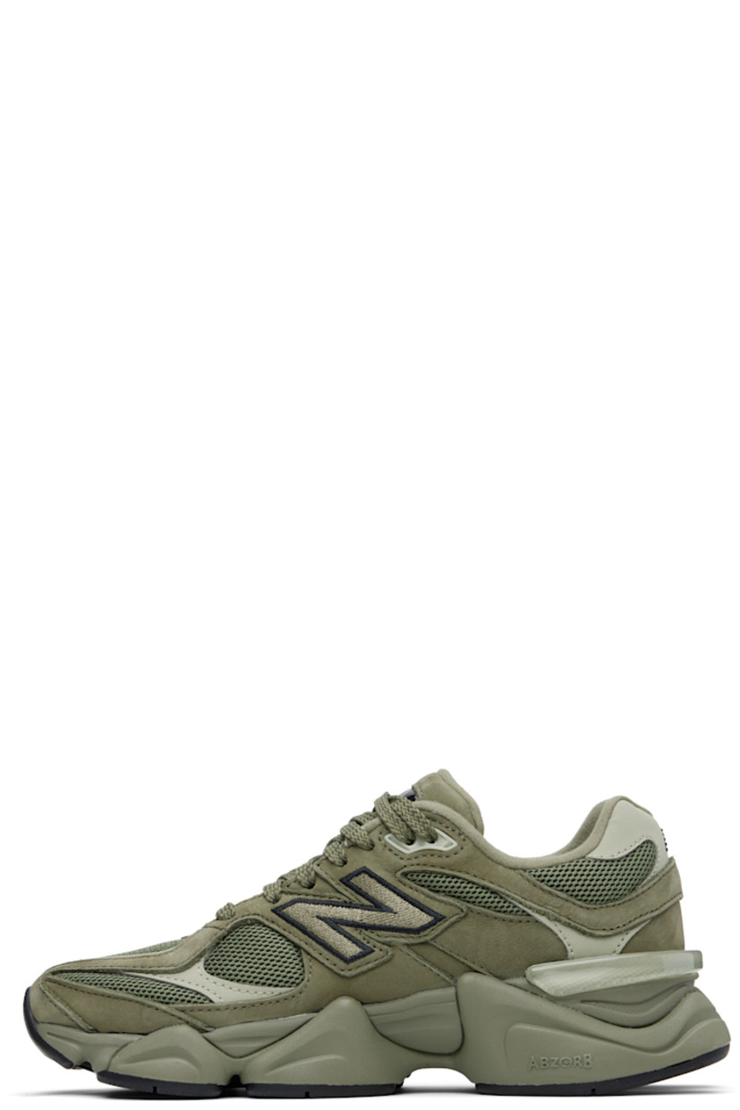 Low-top pigskin nubuck, buffed pigskin, and mesh sneakers in green. Logo embroidered at vamp, inner side, and heel tab.

· Lace-up closure
· Rubberized logo patch at padded tongue
· Padded collar
· Logo appliqué at outer side
· Rubber CR trim at heel counter
· Fleece lining
· ABZORB and SBS dual-density foam rubber midsole
· Treaded rubber sole

Supplier color: Dark olivine/Olivine/Black