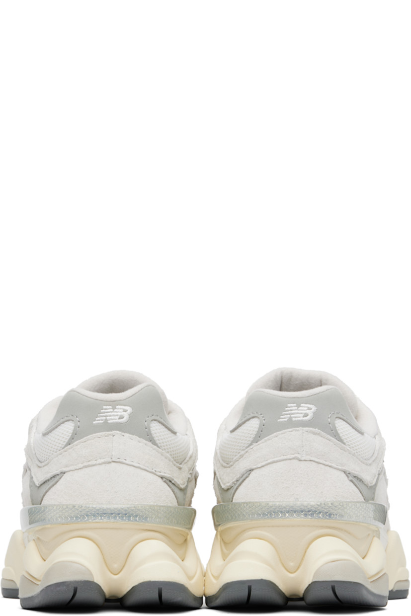 Low-top pigskin suede, buffed pigskin, and mesh sneakers in off-white and gray. Logo embroidered at vamp, inner side, and heel tab.

· Lace-up closure
· Rubberized logo patch at padded tongue
· Padded collar
· Logo appliqué at outer side
· Rubber CR trim at heel counter
· Fleece lining
· ABZORB and SBS dual-density foam rubber midsole
· Treaded rubber sole

Supplier color: Sea salt/Concrete/Silver metallic