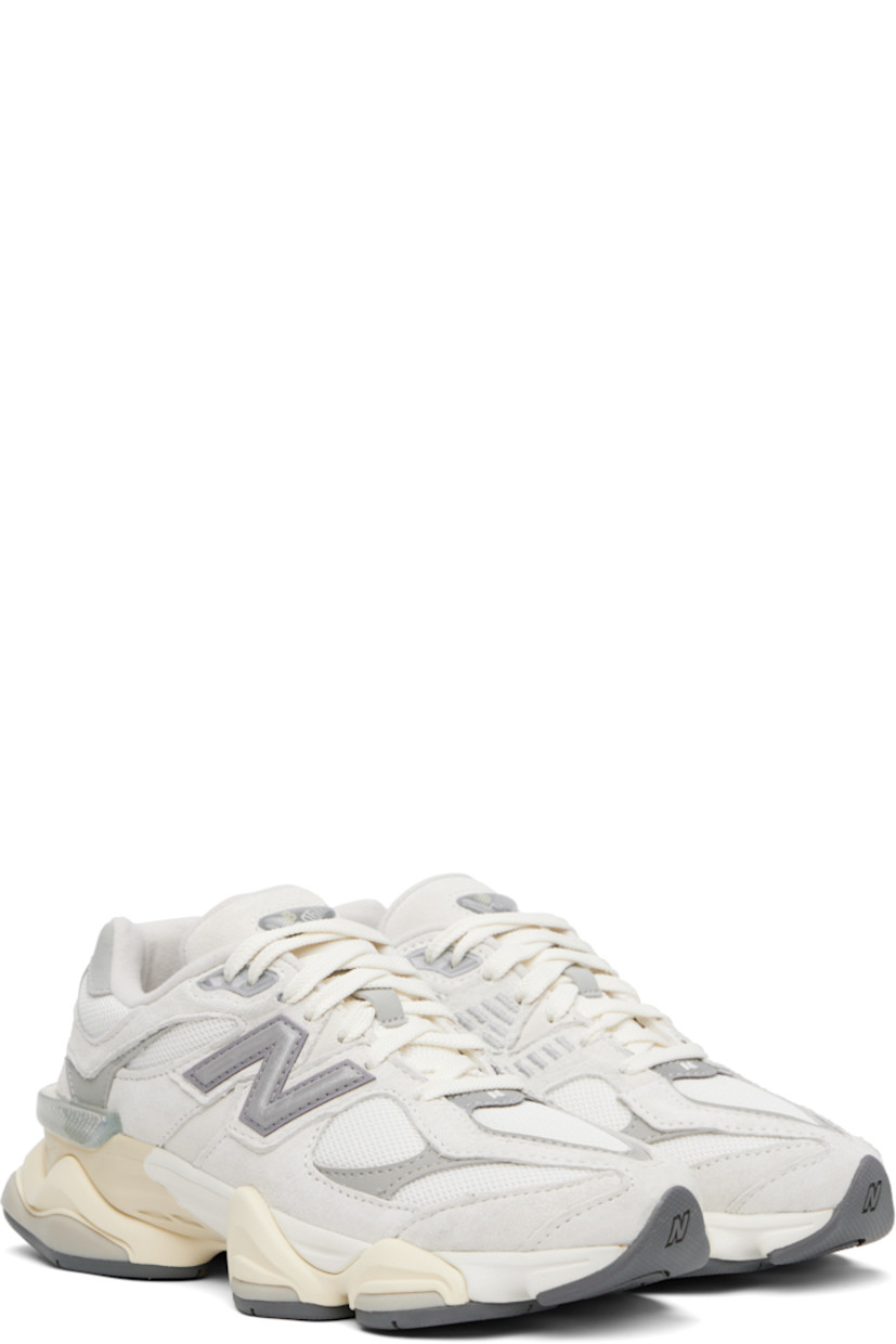 Low-top pigskin suede, buffed pigskin, and mesh sneakers in off-white and gray. Logo embroidered at vamp, inner side, and heel tab.

· Lace-up closure
· Rubberized logo patch at padded tongue
· Padded collar
· Logo appliqué at outer side
· Rubber CR trim at heel counter
· Fleece lining
· ABZORB and SBS dual-density foam rubber midsole
· Treaded rubber sole

Supplier color: Sea salt/Concrete/Silver metallic