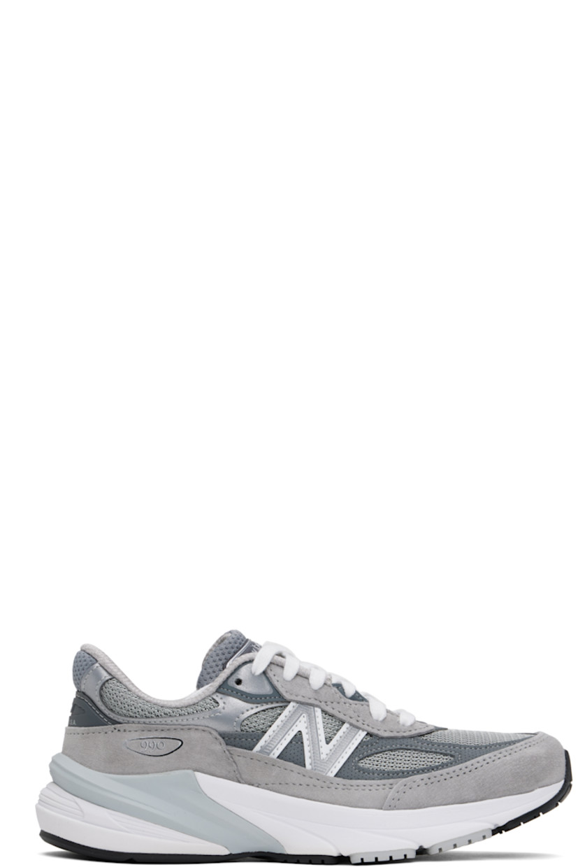 Low-top mesh and pigskin suede sneakers in gray.

· Reflective trim throughout
· Logo printed at vamp
· Lace-up closure
· Logo patch at padded tongue
· Padded collar
· Reflective logo appliqué at sides
· Logo-printed tab at heel counter
· Mesh lining
· ENCAP® and FuelCell foam rubber midsole
· Treaded Ndurance™ rubber sole

Supplier color: Grey