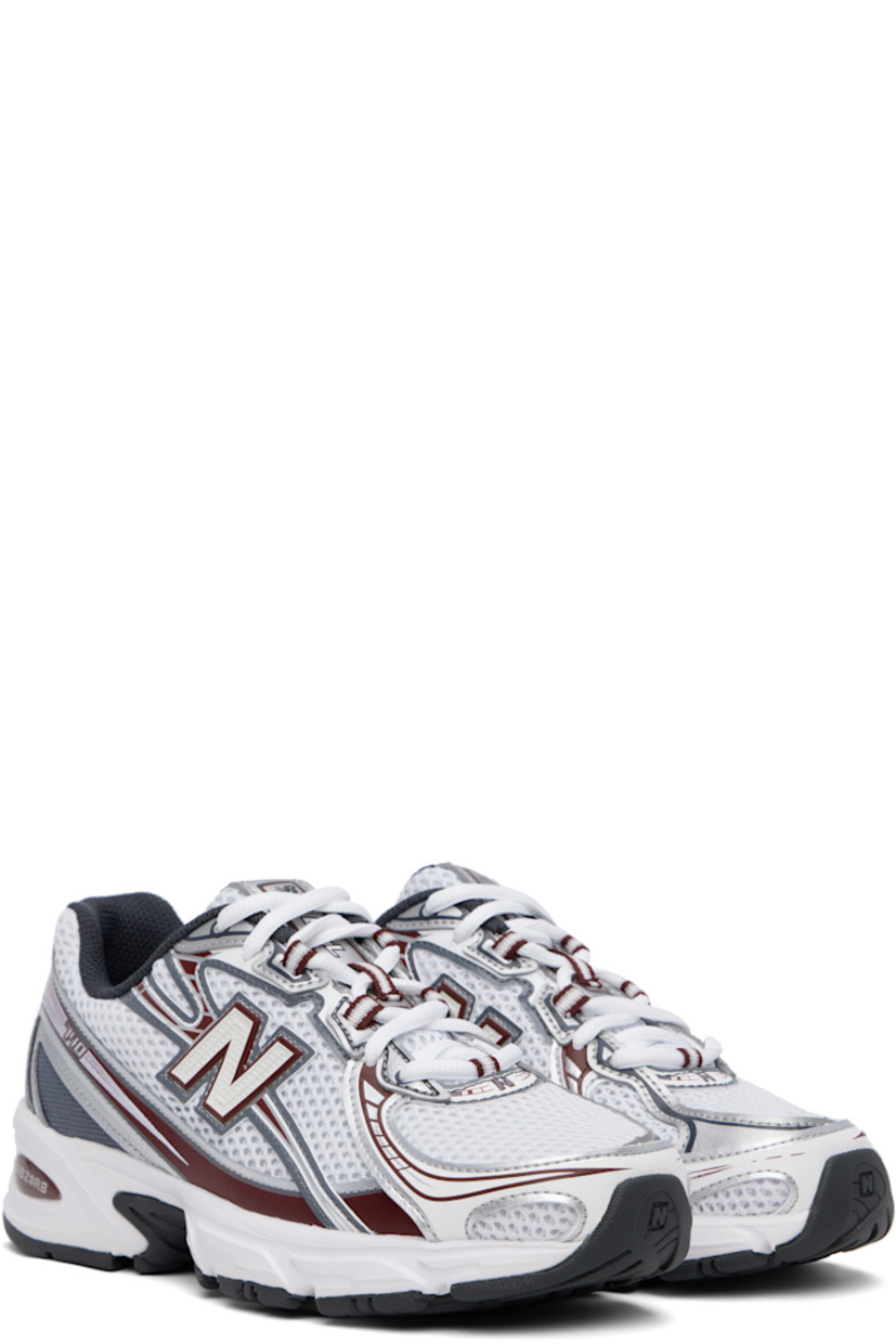 Low-top mesh and grained faux-leather sneakers in white and burgundy.

· Reflective trim throughout
· Logo printed at vamp and heel tab
· Lace-up closure
· Logo patch at padded tongue
· Padded collar
· Logo appliqué at sides
· Mesh lining
· ABZORB foam rubber midsole
· Treaded rubber sole

Supplier color: Mercury red/White/Castlerock