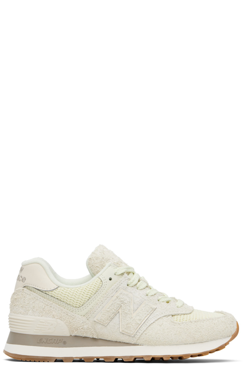 Low-top suede and mesh sneakers in beige and green.

· Lace-up closure
· Logo embroidered at padded tongue
· Padded collar
· Logo appliqué at sides
· Logo embroidered at buffed leather heel tab
· Logo-embossed rubberized heel stabilizer
· Fleece lining
· ENCAP foam rubber midsole
· Treaded rubber sole

Supplier color: Mineral