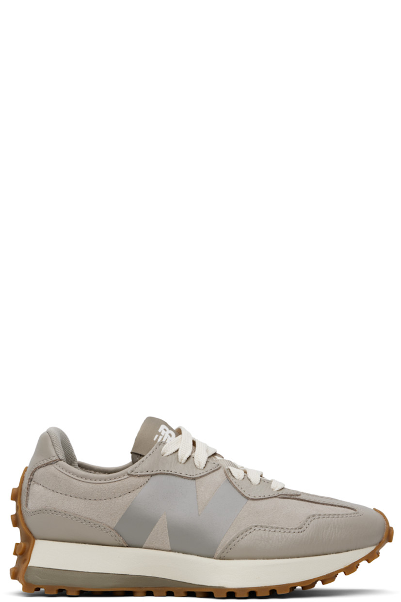 Low-top suede and buffed leather sneakers in gray.

· Lace-up closure
· Logo patch at padded tongue
· Padded collar
· Buffed leather logo at outer side
· Logo printed at inner side
· Mesh lining
· Foam rubber midsole
· Treaded rubber sole

Supplier color: Arid stone/Dockside