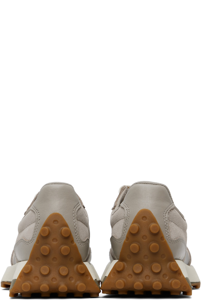 Low-top suede and buffed leather sneakers in gray.

· Lace-up closure
· Logo patch at padded tongue
· Padded collar
· Buffed leather logo at outer side
· Logo printed at inner side
· Mesh lining
· Foam rubber midsole
· Treaded rubber sole

Supplier color: Arid stone/Dockside