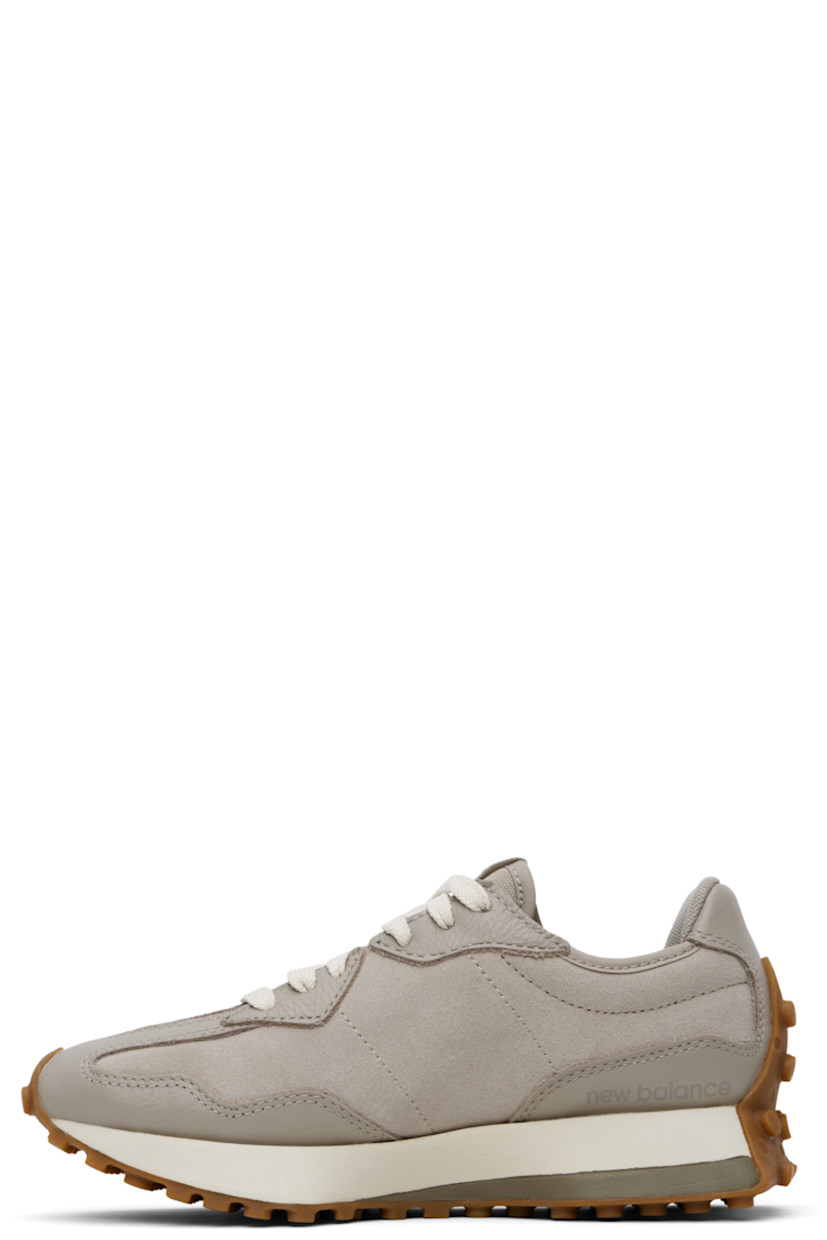 Low-top suede and buffed leather sneakers in gray.

· Lace-up closure
· Logo patch at padded tongue
· Padded collar
· Buffed leather logo at outer side
· Logo printed at inner side
· Mesh lining
· Foam rubber midsole
· Treaded rubber sole

Supplier color: Arid stone/Dockside