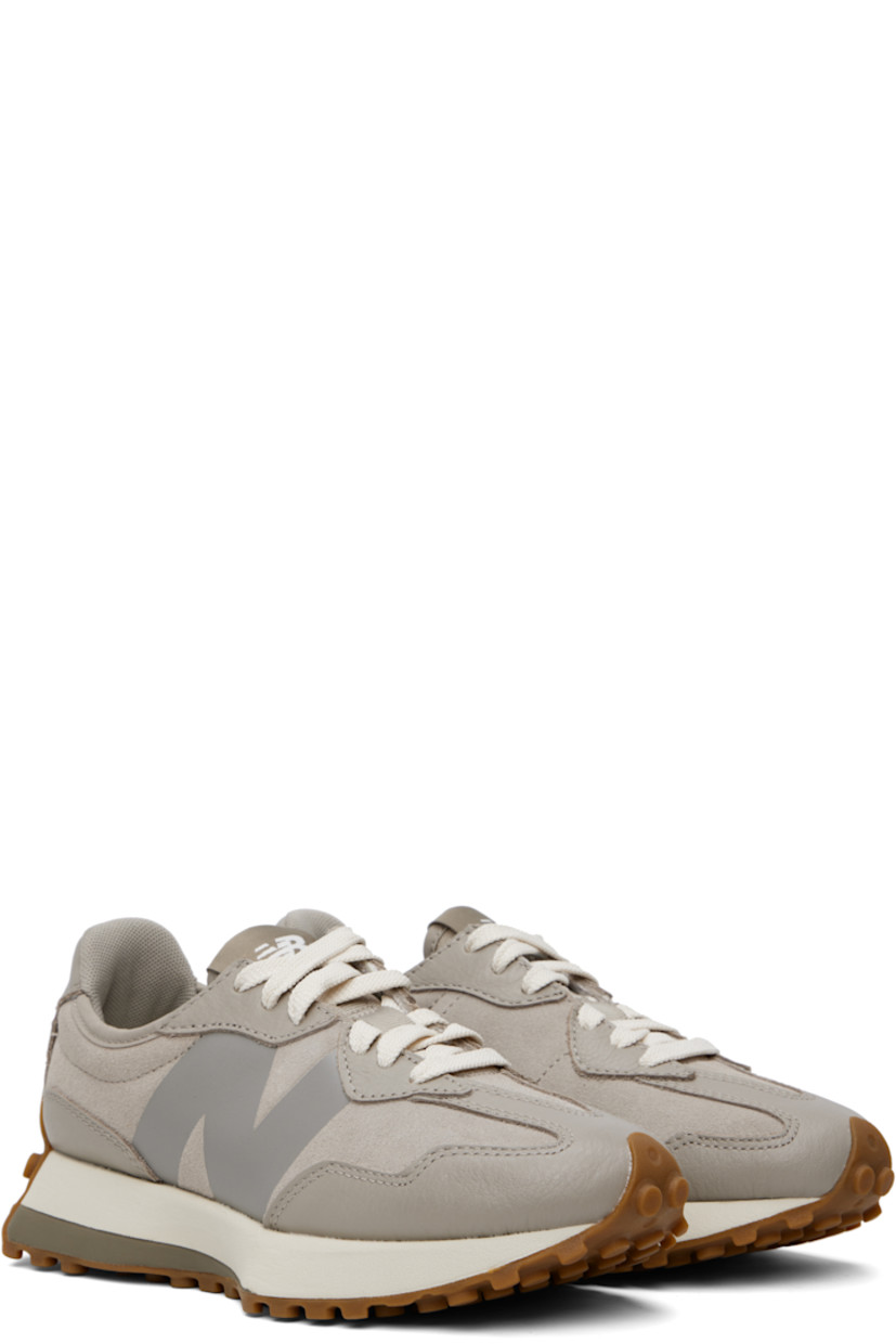 Low-top suede and buffed leather sneakers in gray.

· Lace-up closure
· Logo patch at padded tongue
· Padded collar
· Buffed leather logo at outer side
· Logo printed at inner side
· Mesh lining
· Foam rubber midsole
· Treaded rubber sole

Supplier color: Arid stone/Dockside