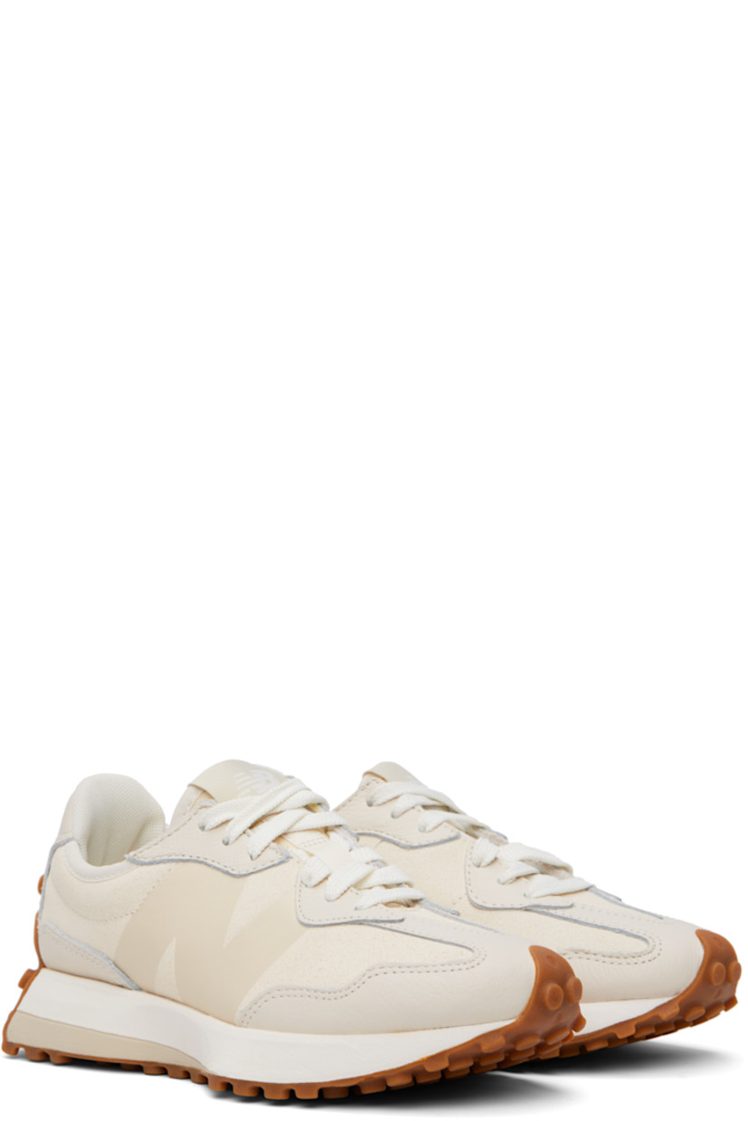 Low-top suede and buffed leather sneakers in off-white.

· Lace-up closure
· Logo patch at padded tongue
· Padded collar
· Buffed leather logo at outer side
· Logo printed at inner side
· Mesh lining
· Foam rubber midsole
· Treaded rubber sole

Supplier color: Linen/Sea salt
