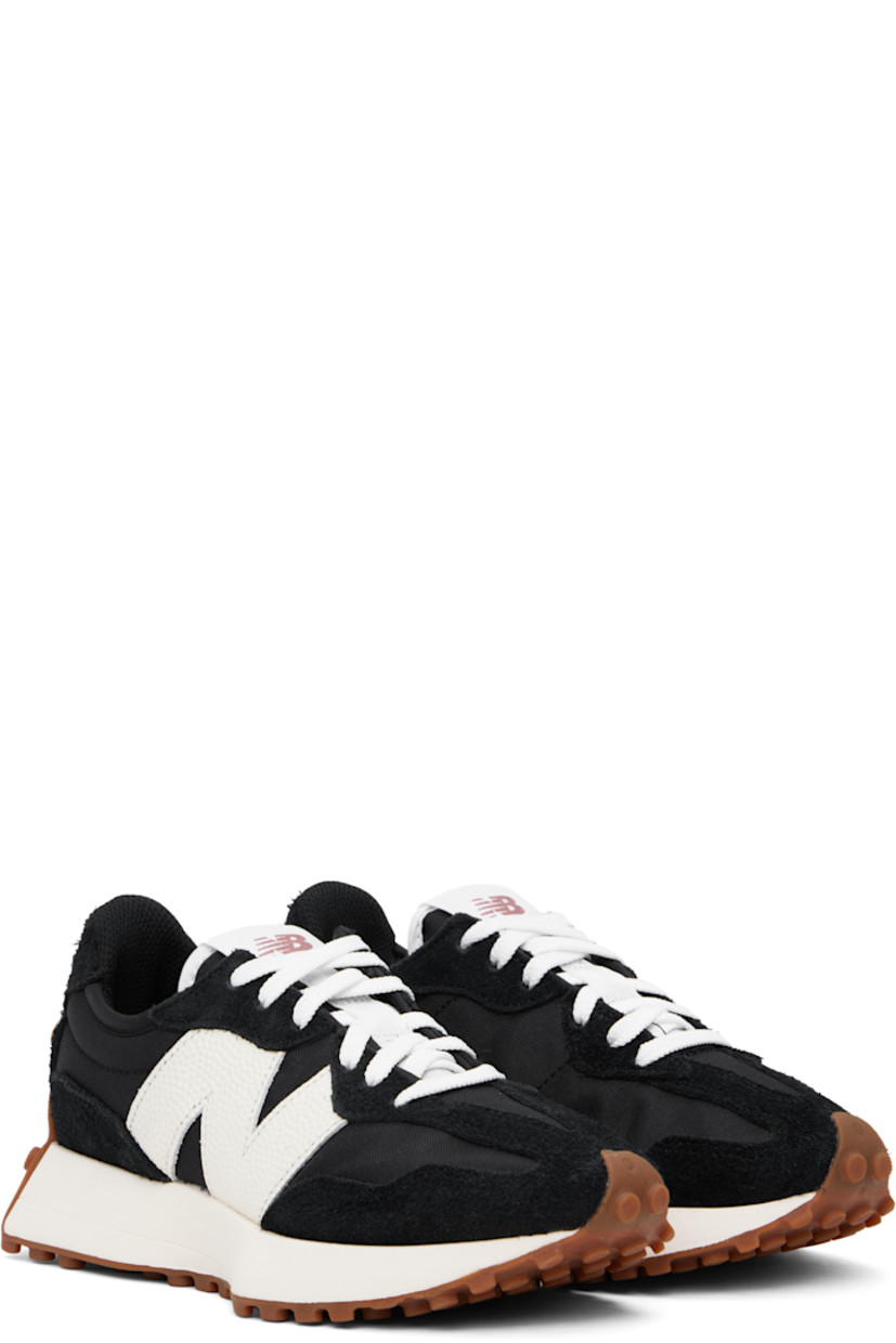 Low-top grained leather, canvas, and suede sneakers in black.

· Lace-up closure
· Logo patch at padded tongue
· Padded collar
· Logo appliqué at outer side
· Logo embroidered at inner side
· Mesh lining
· Foam rubber midsole
· Treaded rubber sole

Supplier color: Black/White/Mineral red