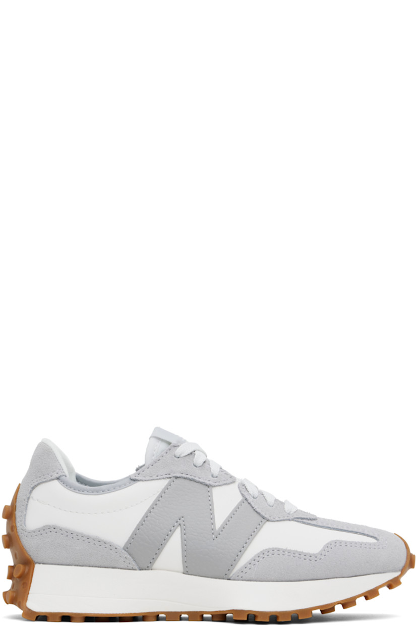 Low-top suede and buffed leather sneakers in white and gray. 

· Lace-up closure
· Logo patch at padded tongue
· Padded collar
· Grained leather logo appliqué at outer side
· Logo embossed at inner side
· Brushed jersey lining
· Foam rubber midsole
· Treaded rubber sole

Supplier color: Raincloud
