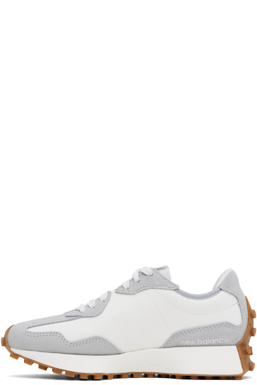 Low-top suede and buffed leather sneakers in white and gray. 

· Lace-up closure
· Logo patch at padded tongue
· Padded collar
· Grained leather logo appliqué at outer side
· Logo embossed at inner side
· Brushed jersey lining
· Foam rubber midsole
· Treaded rubber sole

Supplier color: Raincloud