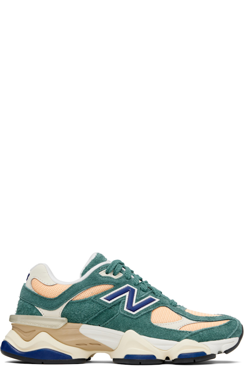 Low-top pigskin suede, buffed pigskin, and mesh sneakers in green and orange. Logo embroidered at vamp, inner side, and heel tab.

· Lace-up closure
· Rubberized logo patch at padded tongue
· Padded collar
· Logo appliqué at outer side
· Rubber CR trim at heel counter
· Fleece lining
· ABZORB and SBS dual-density foam rubber midsole
· Treaded rubber sole

Supplier color: New spruce/Peach blossom/Team royal