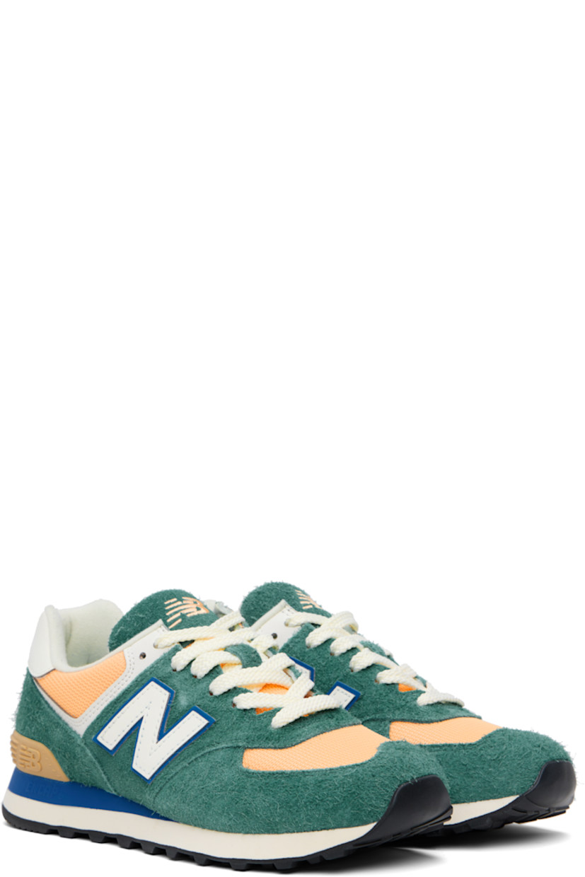 Low-top suede and canvas sneakers in green and orange. 

· Lace-up closure
· Logo embroidered at tongue and heel tab
· Padded tongue and collar
· Logo appliqué at sides
· Logo-embossed rubberized heel stabilizer
· Jersey lining
· ENCAP foam rubber midsole
· Treaded rubber sole

Supplier color: New spruce/Peach blossom/Team royal