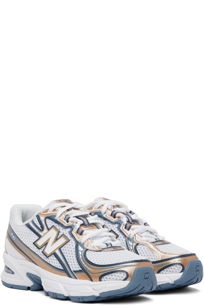 Low-top mesh and grained faux-leather sneakers in white and tan.

· Reflective trim throughout
· Logo printed at vamp and heel tab
· Lace-up closure
· Logo patch at padded tongue
· Padded collar
· Logo appliqué at sides
· Mesh lining
· ABZORB foam rubber midsole
· Treaded rubber sole

Supplier color: Heron blue/Vintage indigo/Gold metallic