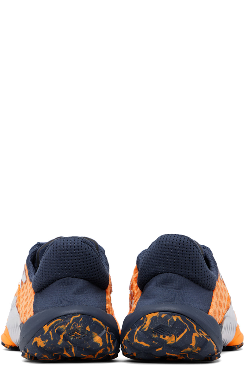 Low-top mesh and jersey sneakers in navy and orange.

· Bonded trim throughout
· Lace-up closure
· Logo printed at padded tongue
· Padded collar
· Logo bonded outer side
· Text bonded at inner side
· Mesh lining
· FuelCell foam rubber midsole
· Treaded AT rubber sole

Supplier color: Sizzle