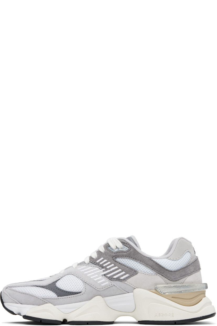 Low-top pigskin suede, buffed pigskin, and mesh sneakers in gray. Logo embroidered at vamp, inner side, and heel tab.

· Lace-up closure
· Rubberized logo patch at padded tongue
· Padded collar
· Logo appliqué at outer side
· Rubber CR trim at heel counter
· Fleece lining
· ABZORB and SBS dual-density foam rubber midsole
· Treaded rubber sole

Supplier color: Rain cloud/Castlerock/White