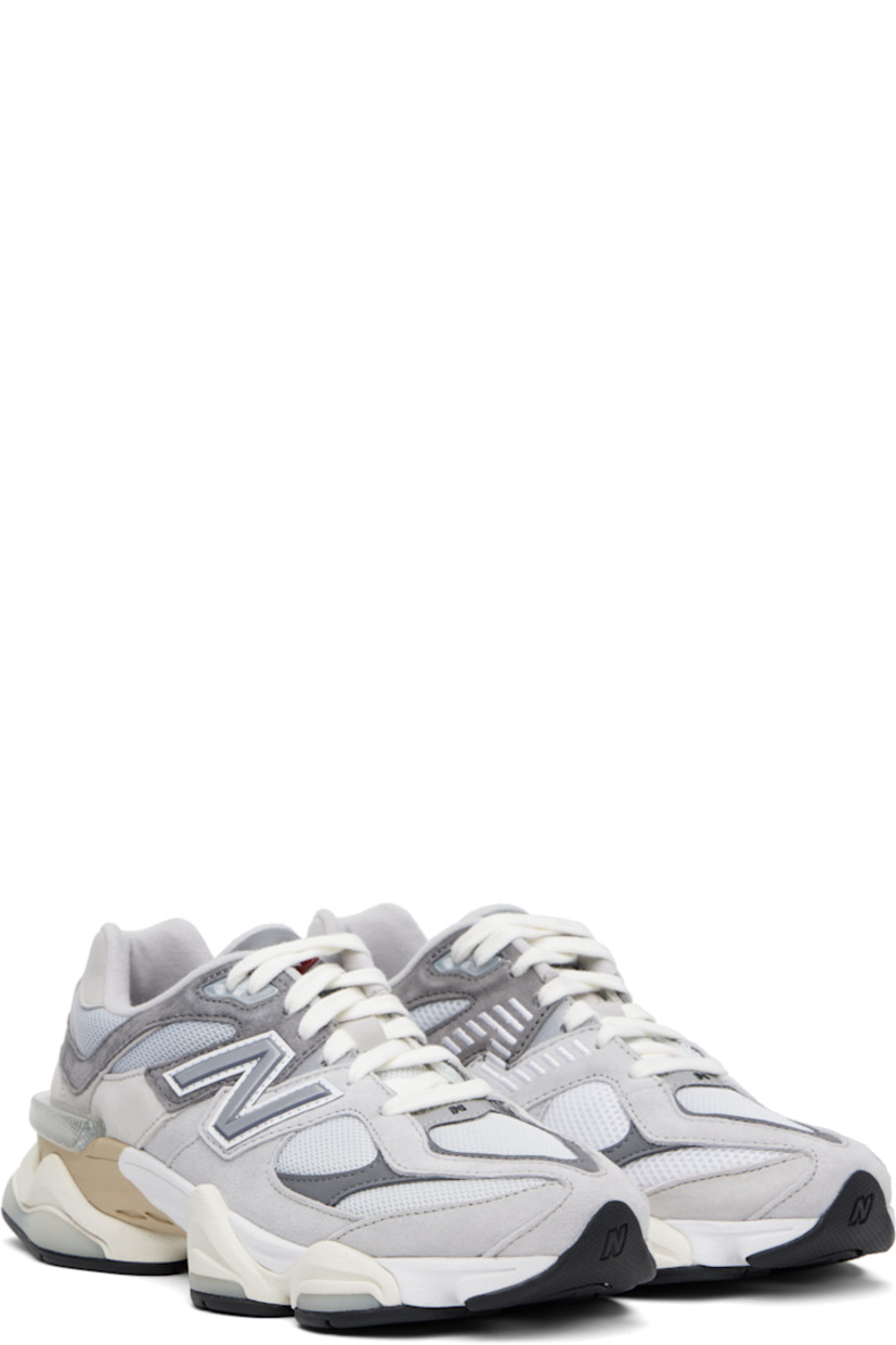 Low-top pigskin suede, buffed pigskin, and mesh sneakers in gray. Logo embroidered at vamp, inner side, and heel tab.

· Lace-up closure
· Rubberized logo patch at padded tongue
· Padded collar
· Logo appliqué at outer side
· Rubber CR trim at heel counter
· Fleece lining
· ABZORB and SBS dual-density foam rubber midsole
· Treaded rubber sole

Supplier color: Rain cloud/Castlerock/White