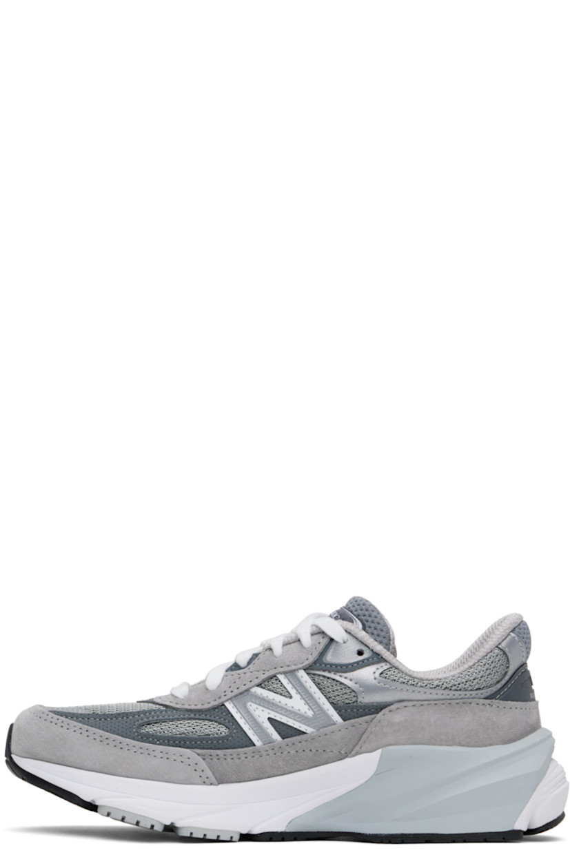 Low-top mesh and pigskin suede sneakers in gray.

· Reflective trim throughout
· Logo printed at vamp
· Lace-up closure
· Logo patch at padded tongue
· Padded collar
· Reflective logo appliqué at sides
· Logo-printed tab at heel counter
· Mesh lining
· ENCAP® and FuelCell foam rubber midsole
· Treaded Ndurance™ rubber sole

Supplier color: Grey