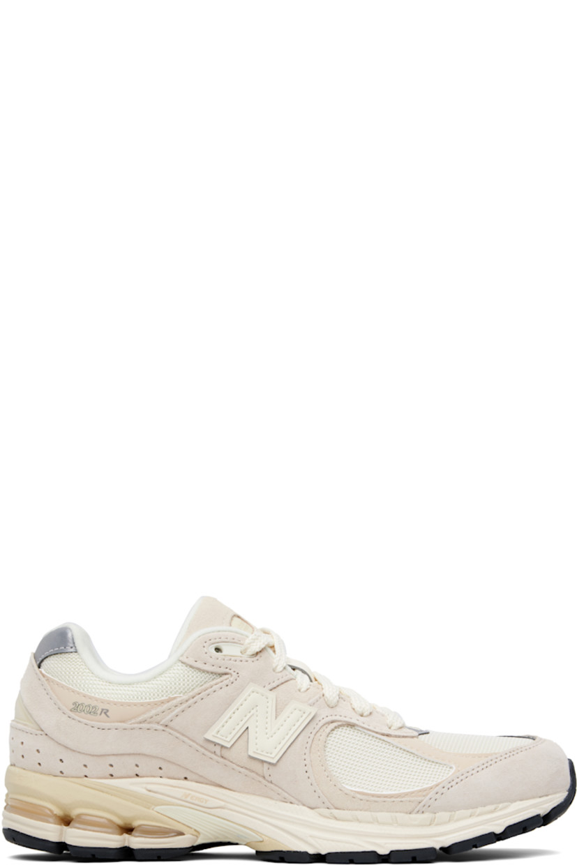 Low-top pigskin suede, buffed pigskin, and mesh sneakers in beige.

· Logo embossed at toe 
· Logo embroidered at vamp
· Lace-up closure
· Inset logo patch at padded tongue
· Padded collar
· Logo appliqué at sides and heel counter 
· Logo printed at outer side
· Perforations at heel counter
· ABZORB SBS cushioning at heel
· Fleece lining
· ACTEVA LITE foam rubber midsole
· Treaded N-ergy rubber sole with Stability Web technology

Supplier color: Calm taupe/Angora/Silver metalic