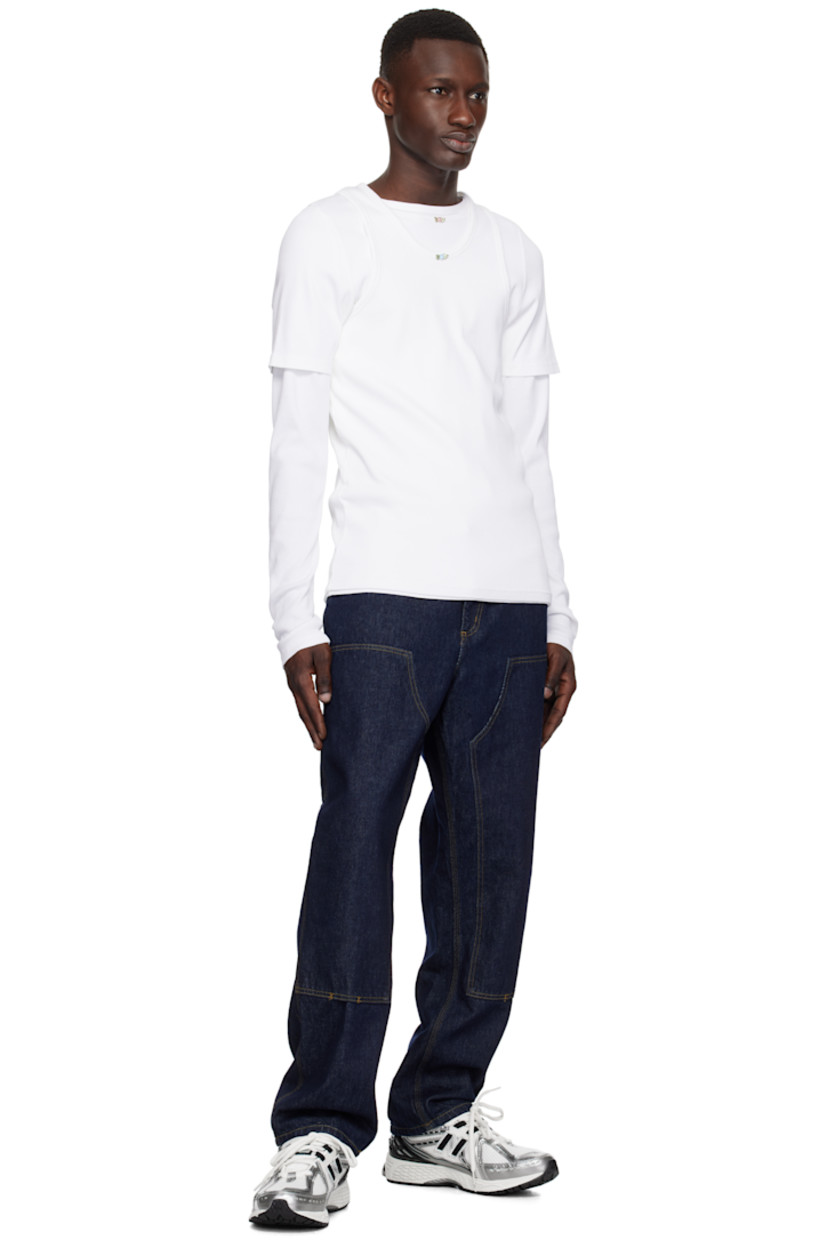 Low-top mesh and grained faux-leather sneakers in white and silver tone.

· Logo printed at vamp
· Lace-up closure
· Logo patch at padded tongue
· Padded collar
· Logo appliqué at sides
· Reflective trim at heel tab
· Logo-embossed rubberized trim at heel counter
· Mesh lining
· ABZORB SBS foam rubber midsole
· ACTEVA LITE unit at foam midsole
· Treaded N-ergy rubber sole
· Stability Web technology at sole

Supplier color: Silver metallic/Black/Sea salt