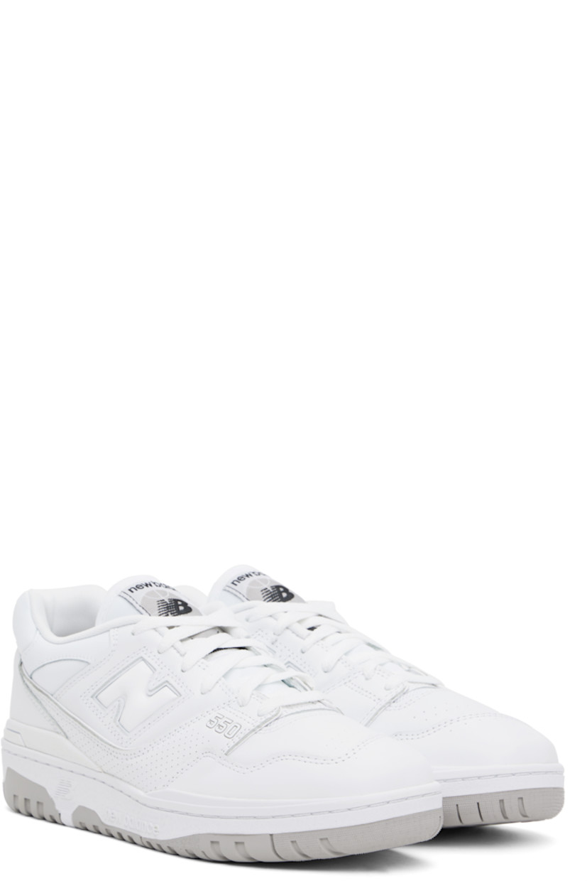Low-top buffed leather sneakers in white.

· Perforated detailing throughout
· Lace-up closure
· Logo patch at padded tongue
· Padded collar
· Logo embossed at sides
· Logo printed at heel counter
· Mesh lining
· Logo embossed at textured rubber midsole
· Treaded rubber sole

Supplier color: White