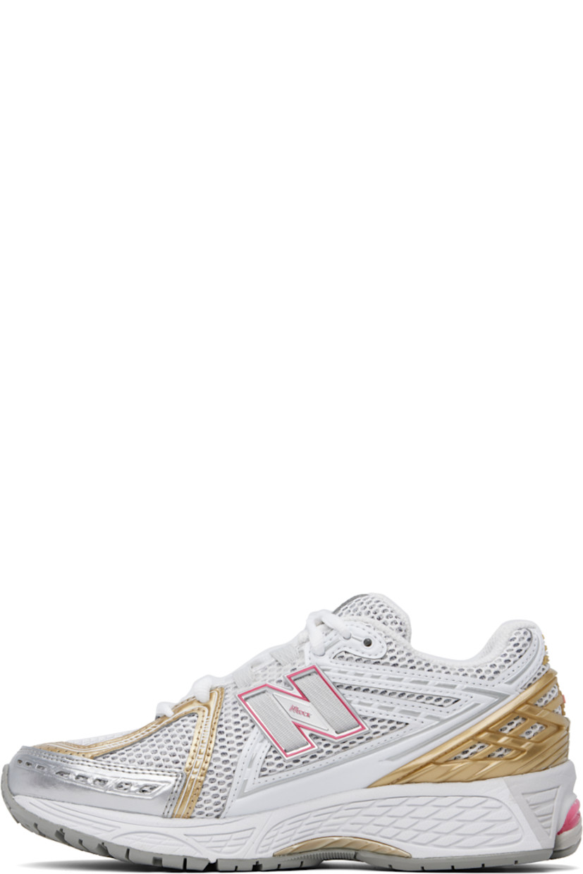 Low-top mesh and grained faux-leather sneakers in silver tone and gold tone.

· Logo embossed at toe 
· Logo printed at vamp
· Lace-up closure
· Logo patch at padded tongue
· Padded collar
· Logo appliqué at sides
· Logo-embossed rubberized heel stabilizer
· ABZORB SBS cushioning at heel
· Mesh lining
· ACTEVA LITE foam rubber midsole
· Treaded N-ergy rubber sole with Stability Web technology

Supplier color: Silver metallic/Dragon berry/White