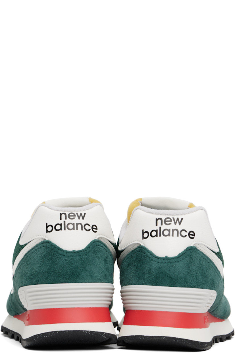 Low-top mesh, suede, and grained leather sneakers in green.

· Lace-up closure
· Logo patch at padded tongue
· Padded collar
· Logo appliqué at sides
· Logo printed at heel tab
· Logo-embossed rubberized trim at heel counter
· Terrycloth lining
· ENCAP® foam rubber midsole
· Treaded rubber sole

Supplier color: New spruce/Sea salt