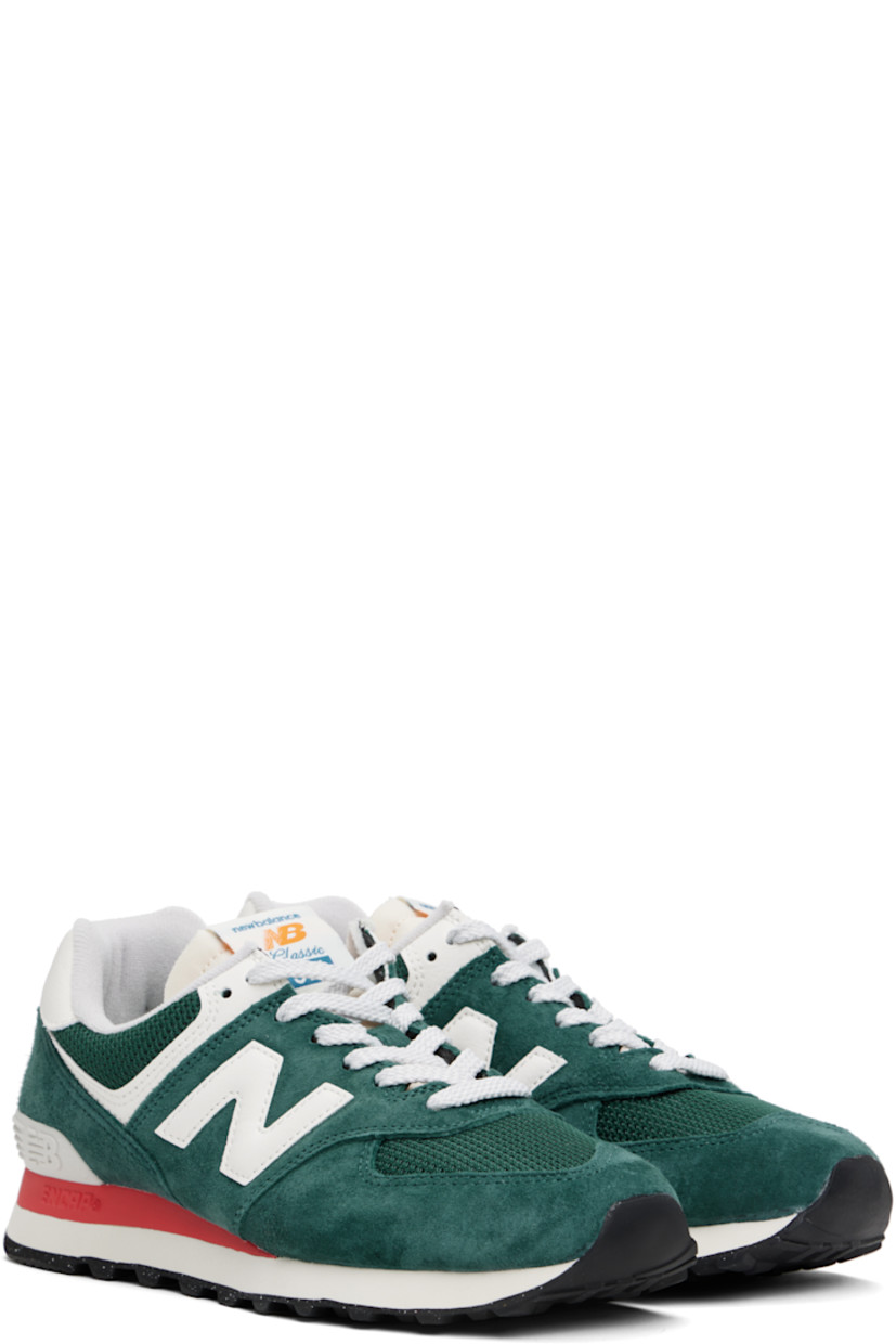 Low-top mesh, suede, and grained leather sneakers in green.

· Lace-up closure
· Logo patch at padded tongue
· Padded collar
· Logo appliqué at sides
· Logo printed at heel tab
· Logo-embossed rubberized trim at heel counter
· Terrycloth lining
· ENCAP® foam rubber midsole
· Treaded rubber sole

Supplier color: New spruce/Sea salt