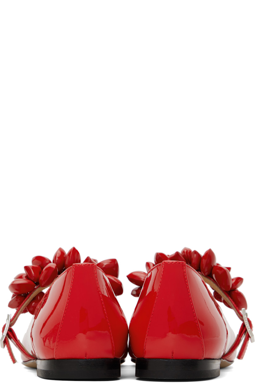 Patent leather Mary Jane-style ballerina flats in red. Graphic and crystal-cut charms at partially elasticized pin-buckle strap.

· Square toe
· Grained leather lining
· Stacked leather heel with rubber injection
· Leather sole

Supplier color: Red