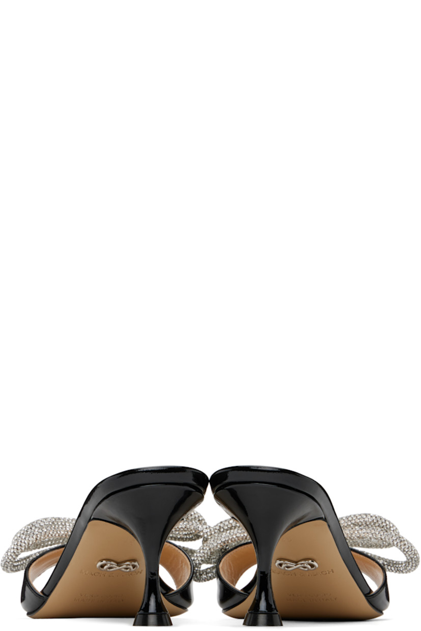 Patent leather heeled sandals in black.

· Open toe
· Bow with crystal-cut accents at vamp
· Logo stamp at padded footbed
· Buffed leather lining
· Covered spool heel with rubber injection
· Leather sole
· Heel: H2"

Supplier color: Black